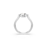 Silver-toned ring with a large clear stone flanked by two square clear stones. The band features small clear stones on its up