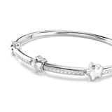 Silver-toned bangle with three iridescent star charms and clear rectangular crystals along the band.