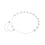Silver-toned necklace with iridescent star-shaped crystals spaced along one side of the chain, featuring a lobster clasp and