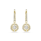Gold-toned hoop earrings with clear stones. Round charms feature a large central clear stone surrounded by smaller clear ston