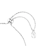 Silver-toned chain bracelet with a spherical adjustable slider bead and an octagonal charm featuring a swan logo.