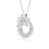Silver-toned necklace featuring an open circular pendant encrusted with clear marquise-cut crystals in a swirling design.