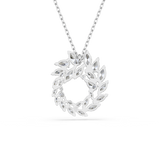 Silver-toned necklace with a circular pendant featuring clear, marquise-cut crystals arranged in a leaf-like wreath design.