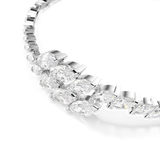 Silver-toned necklace or bracelet with clusters of clear, faceted stones. Each cluster has a large marquise-cut stone surroun