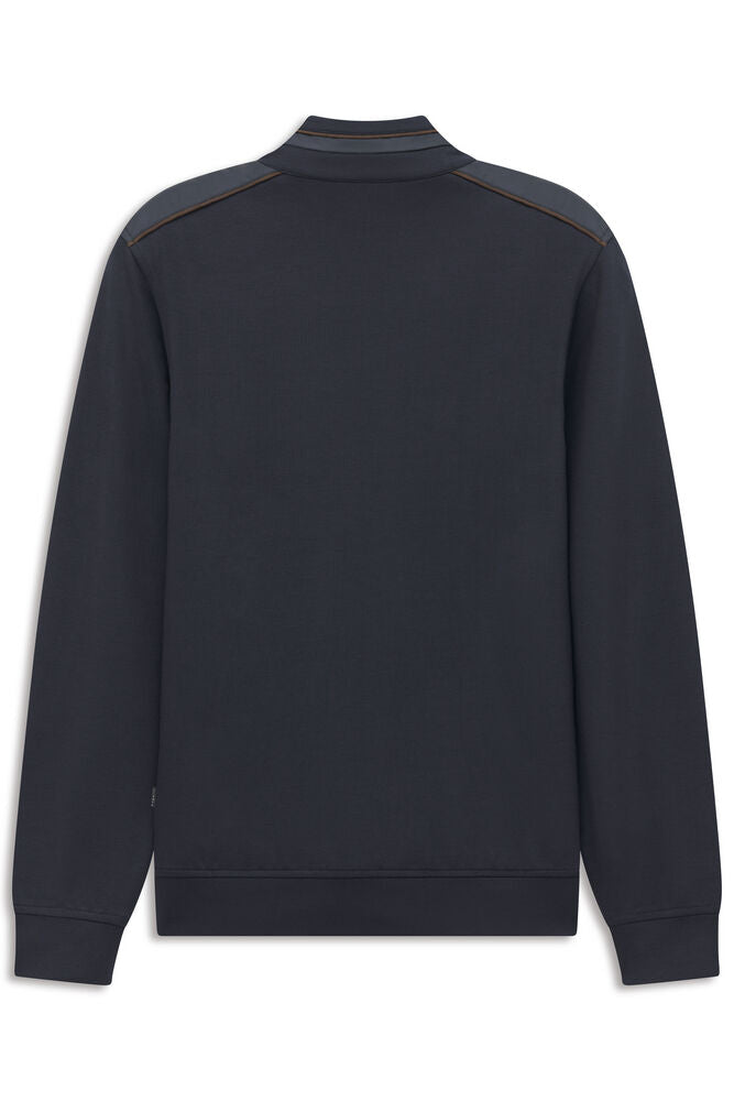 Dark blue men's jacket, back view. Stand collar with two stripes, dark gray shoulder panels with brown piping, ribbed cuffs a