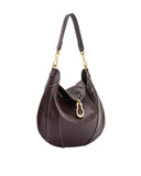 Dark brown shoulder bag with white contrast stitching, gold-toned chain links, and an irregular gold-toned zipper pull.