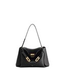 Black pebbled leather shoulder bag with a single strap, gold-toned hardware, and two decorative front buckles.