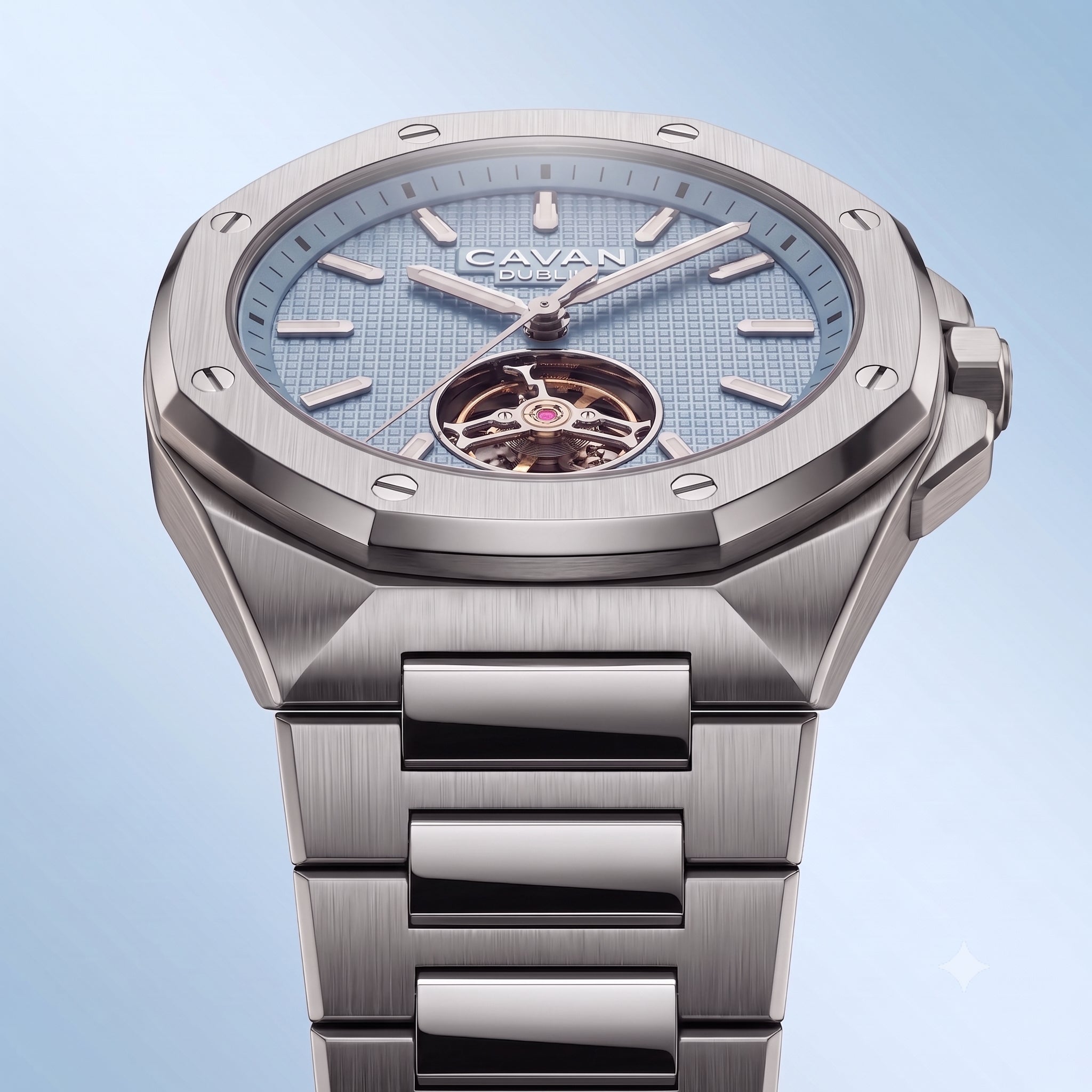 Silver-toned watch with a light blue grid dial, open heart movement with gold-toned gears, and metal bracelet.