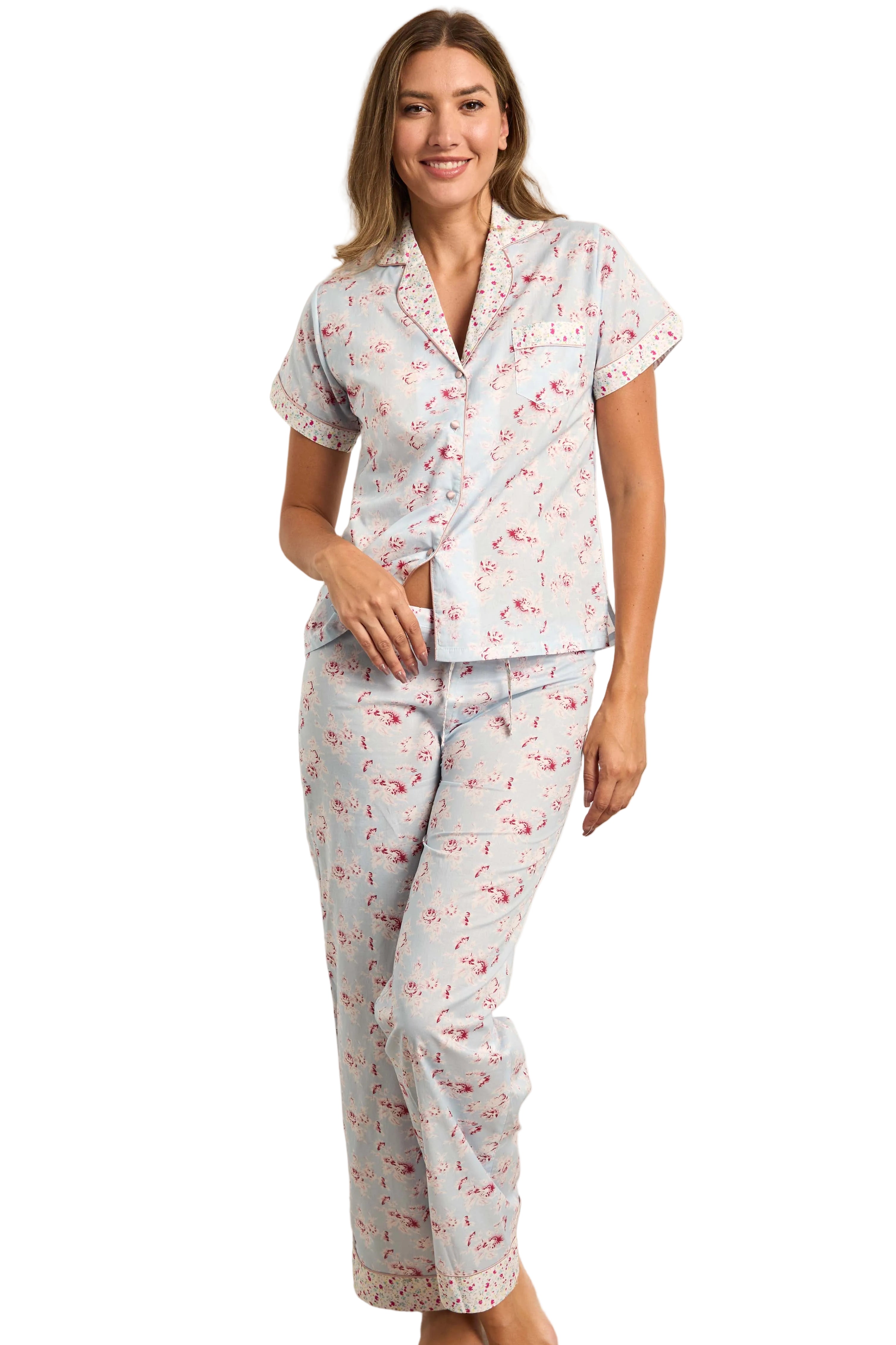 Light blue SuperVoile pyjama set with short-sleeved top and long trousers, featuring a red floral pattern and white piping.