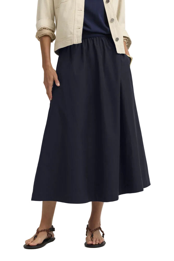 Navy blue long A-line skirt with an elasticated waistband and side pockets.