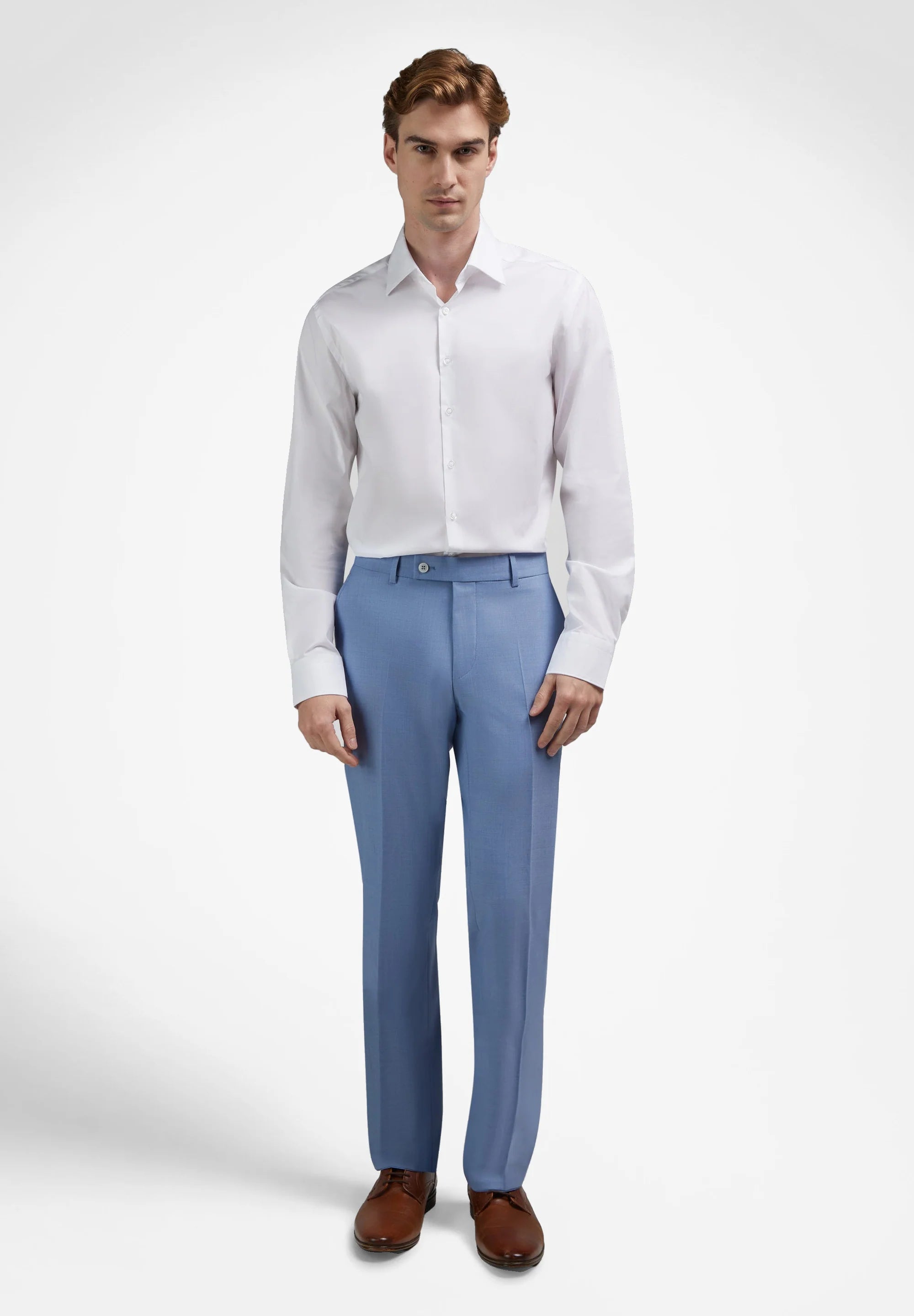 White long-sleeved dress shirt with a pointed collar, full button-front, and buttoned cuffs.