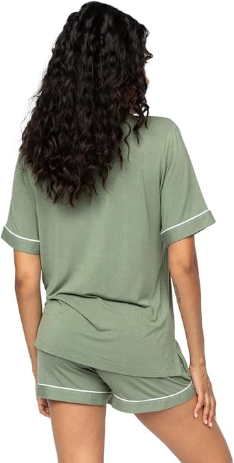 Sage green jersey short-sleeved top and shorts set with white piping on sleeve cuffs and short leg openings.
