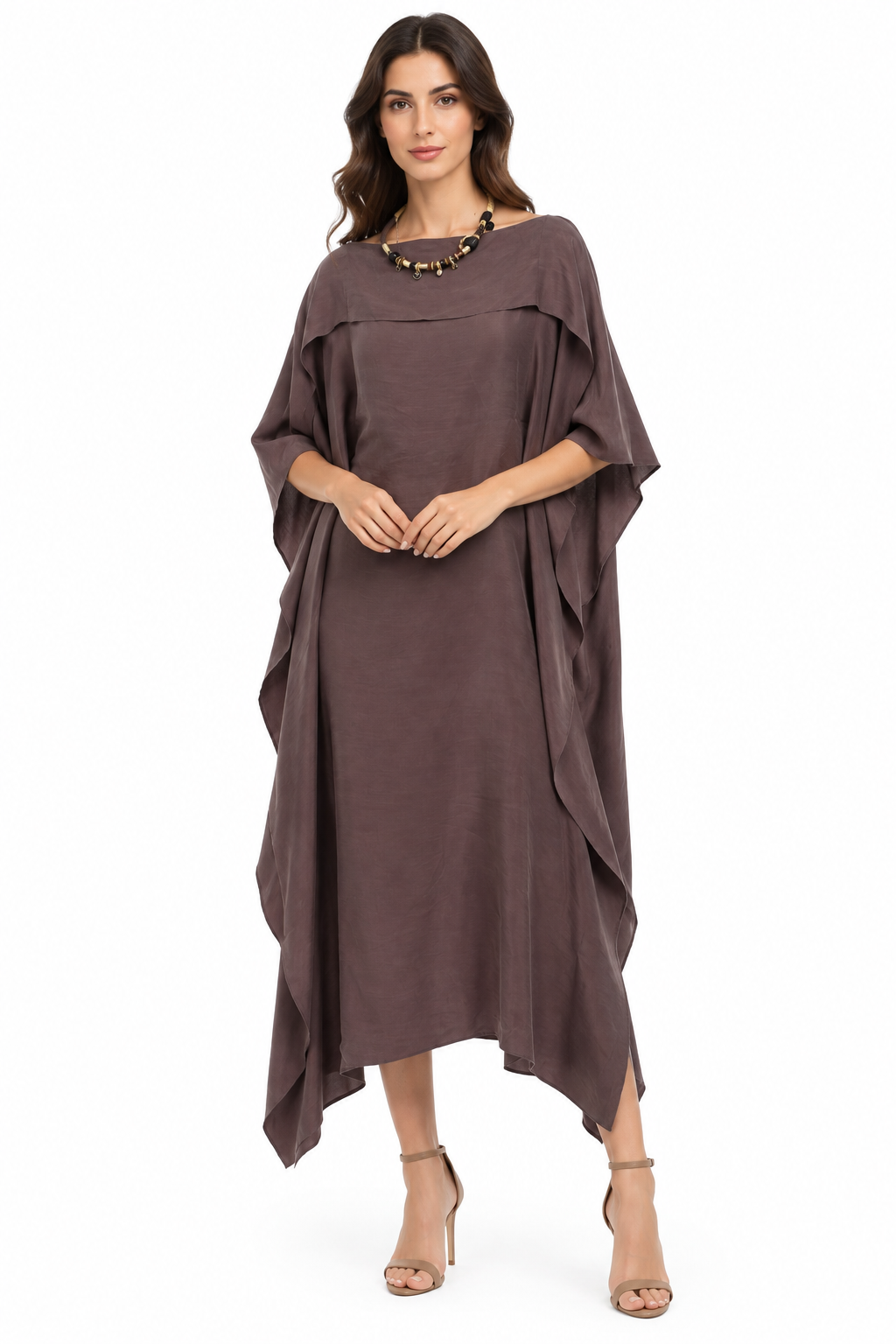 Brown kaftan dress with a boat neck, draped shoulder overlay, wide sleeves, and an asymmetrical handkerchief hem.
