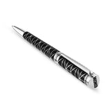 Black lacquer pen with silver-toned geometric pattern, clip, tip, and end. Clip engraved "ST HONORE PARIS".