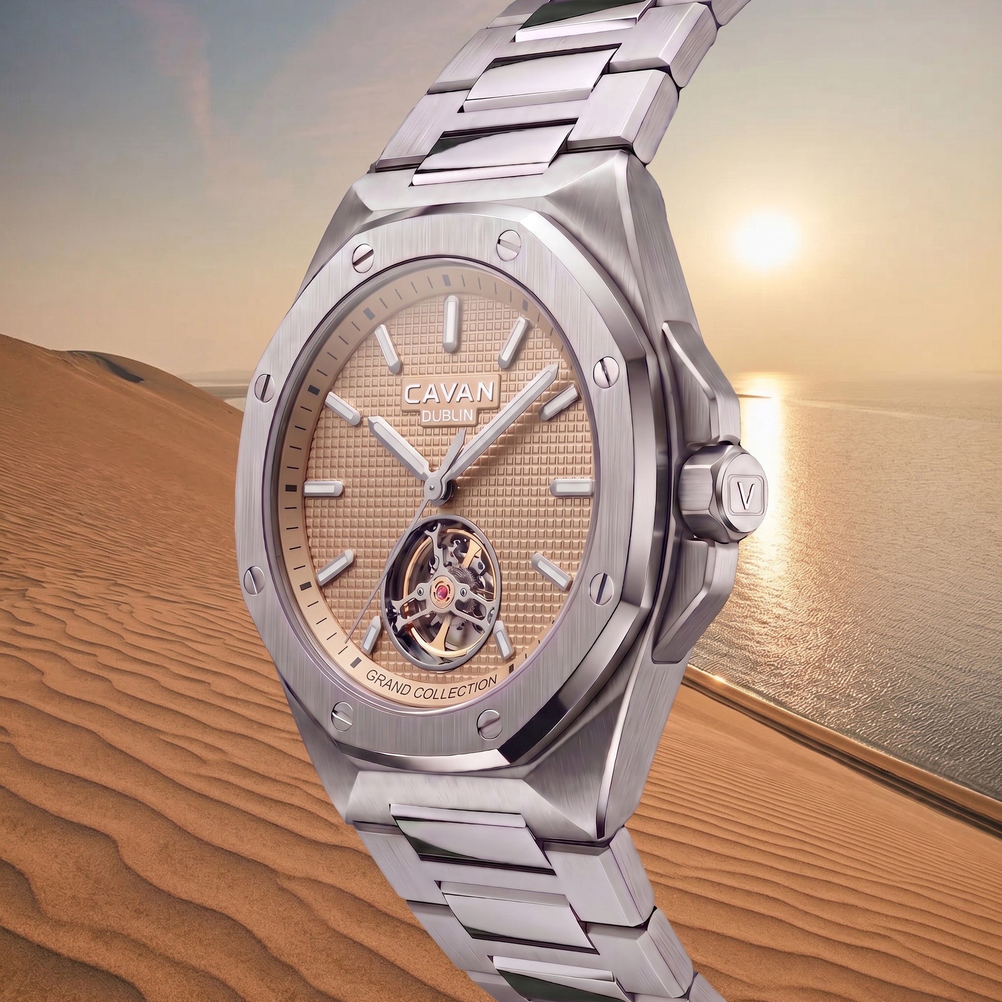 Silver-toned metal wristwatch with an octagonal bezel, gold-toned textured dial, visible tourbillon, and silver-toned link br
