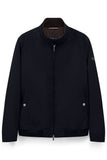 Dark blue blouson jacket with full zip, stand-up collar with brown ribbed lining, two front pockets with silver-toned snaps,