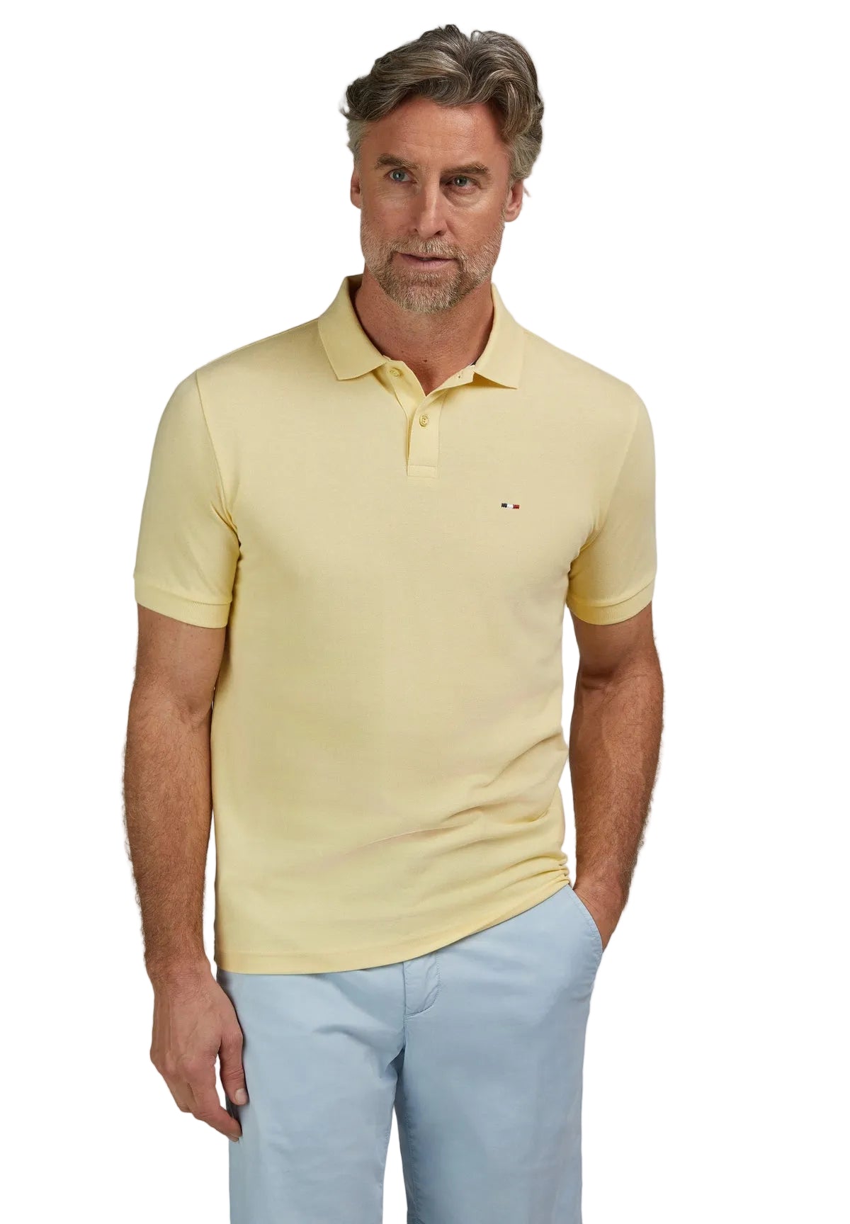 Vanilla yellow short sleeve polo shirt with a classic collar, two-button placket, and a small embroidered emblem on the chest