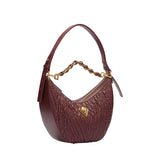 Orlandi Valentino Women's Wine Quilted Crescent Hand Bag
