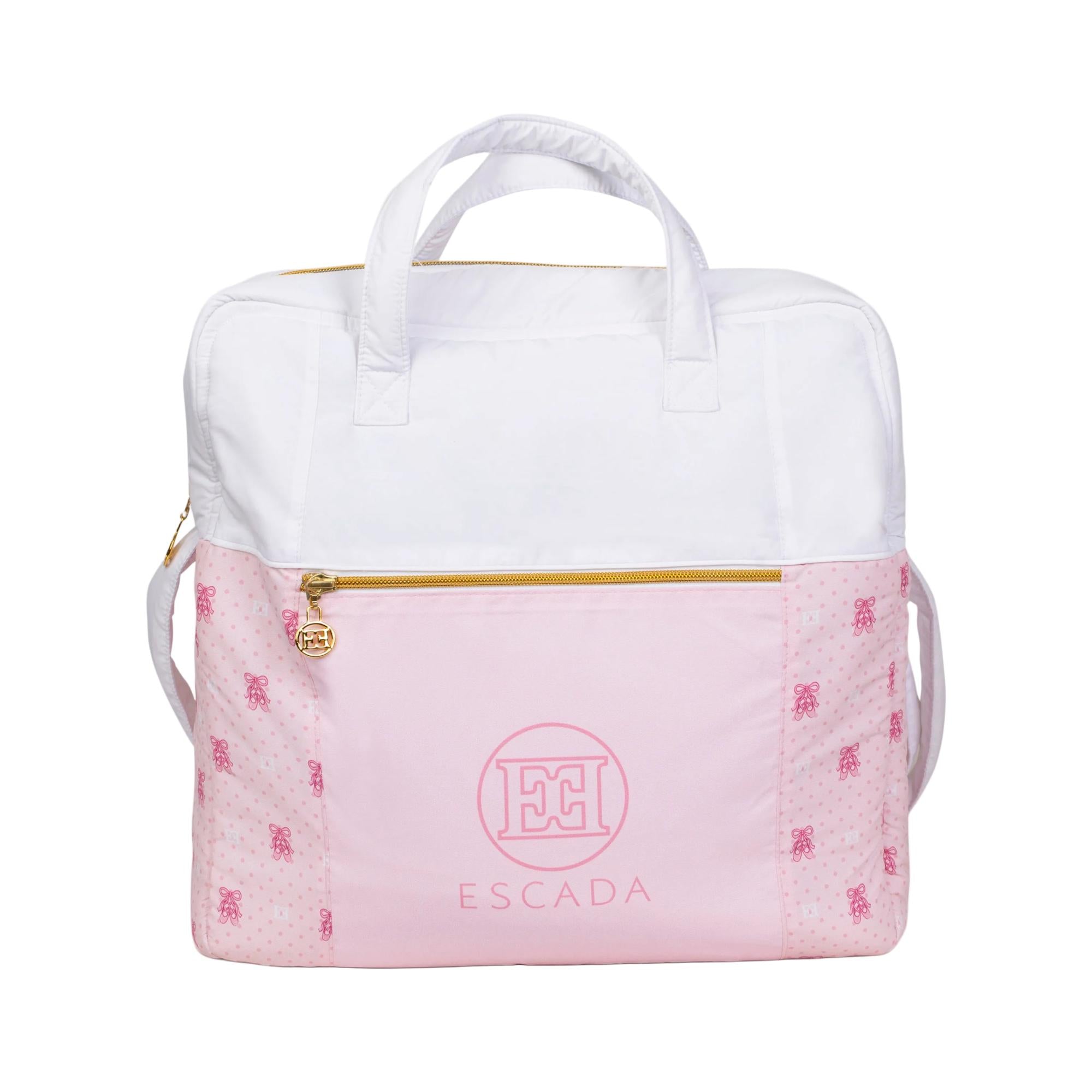 Escada Kids changing bag in white and pink, with ballet slipper pattern, gold-toned zippers, and top handles.