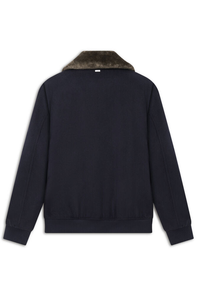 Navy blue bomber jacket with a dark brown faux fur collar, ribbed cuffs, and ribbed hem, viewed from the back.