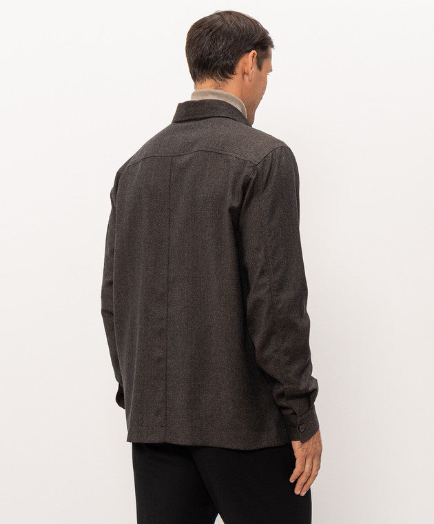 Brown textured sport jacket with a collar, long sleeves, single-button cuffs, and a back yoke.