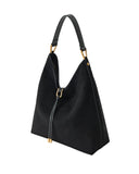 Black faux suede shoulder bag with a single strap, gold-toned hardware, and two black tassels with gold-toned caps.