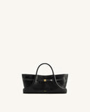 Black leather-look tote bag with a flared base, two top handles, white stitching, a gold-toned buckle strap, and JW PEI logo.