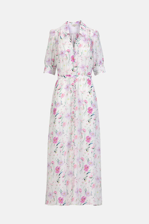 Off-white maxi shirt dress with fuchsia and purple floral print, collared V-neck, button-front, short puffed sleeves, and gat