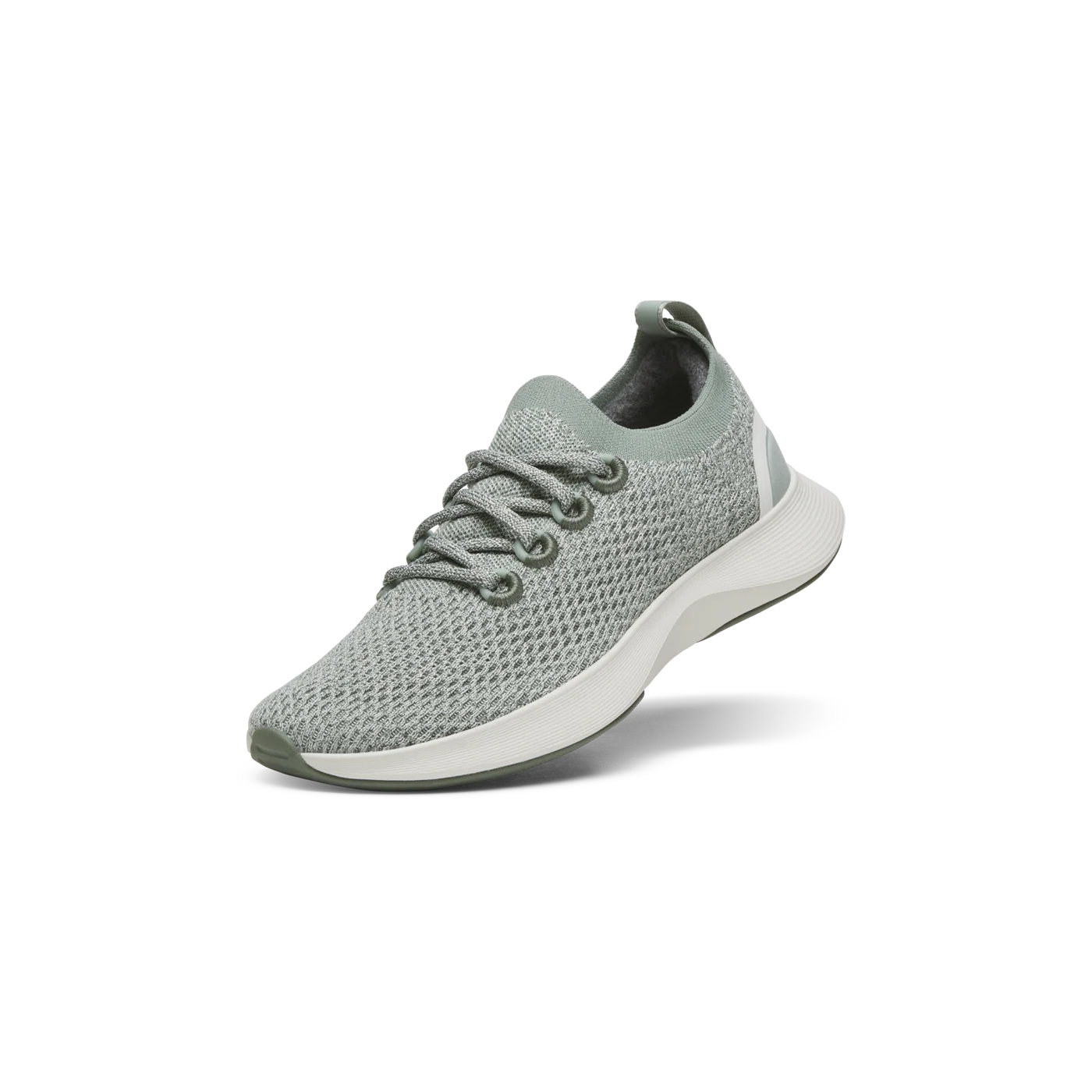 Light green knit sneaker with matching laces, a sock-like collar, white midsole, dark green outsole, and a white stripe on th