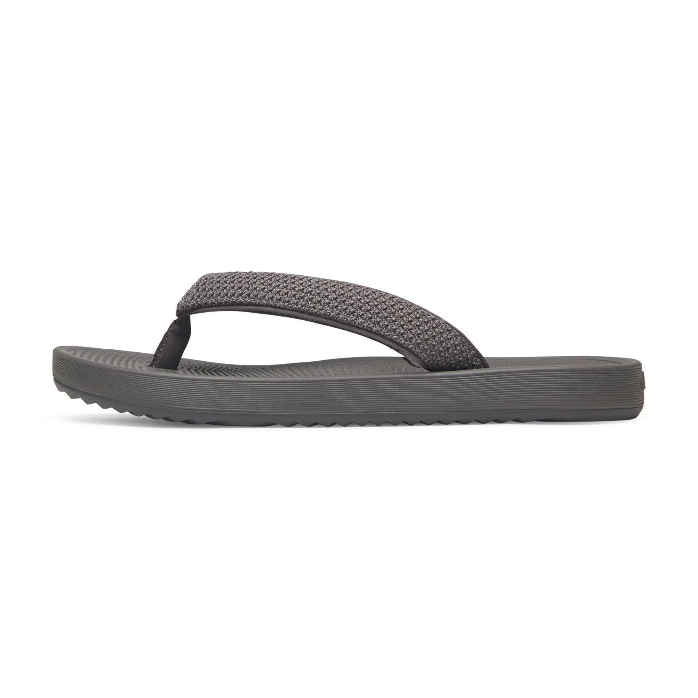 Single grey flip-flop with a textured wide strap and a thick, ridged sole, viewed from the side.