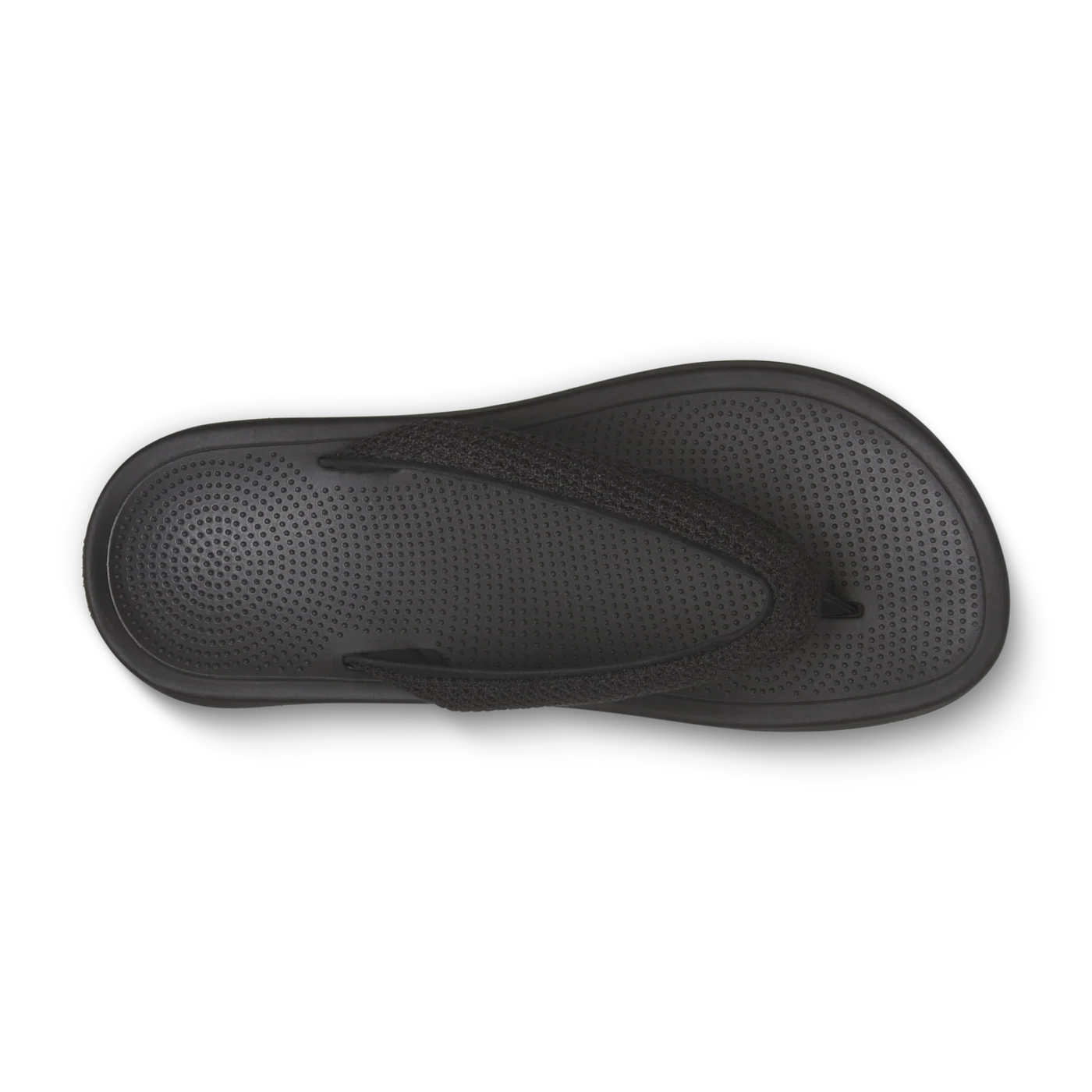 Black flip-flop with a textured footbed featuring small raised dots and a black thong strap.