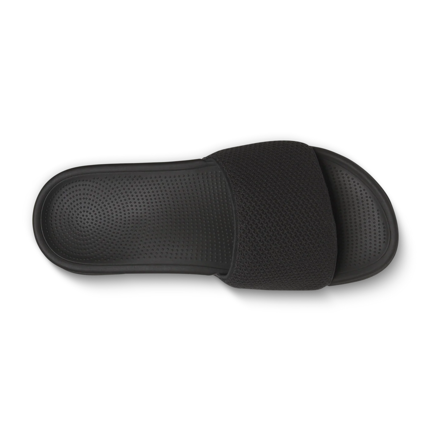 A single black slide sandal with a textured footbed and a wide, woven textile strap.