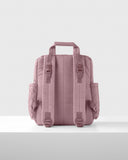 Mauve Mist quilted backpack with two padded shoulder straps, adjustable buckles, a top carry handle, and quilted side pockets