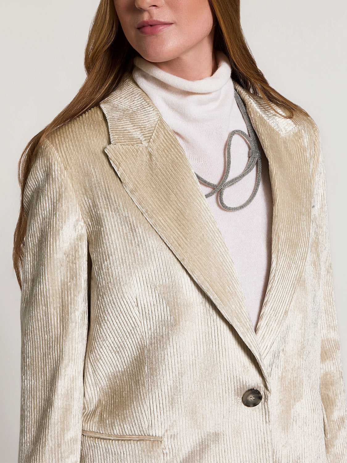 Star Dust Beige ribbed velvet single-breasted blazer with notched lapels, one dark button closure, and one flap pocket.