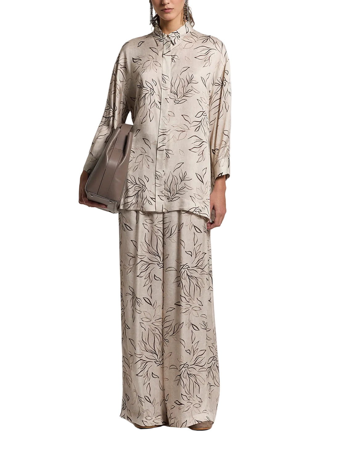Beige wide-leg trousers with an all-over dark brown abstract leaf print.