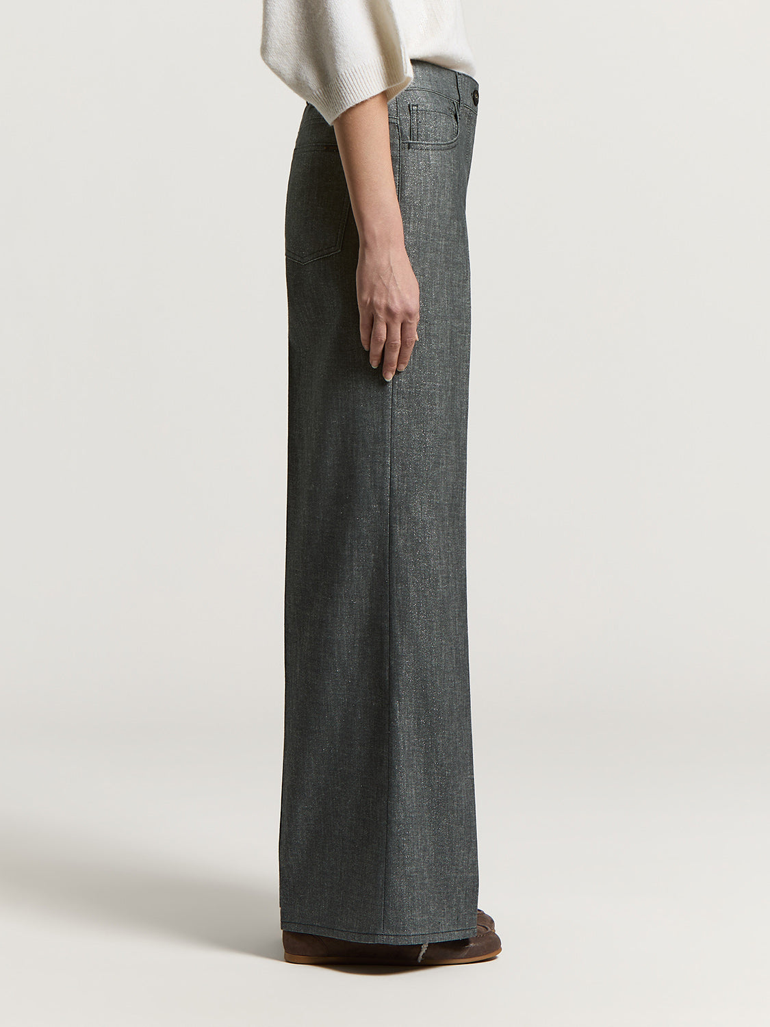 Mercury grey high-waisted wide-leg trousers with front and back pockets, and a button-fly closure.
