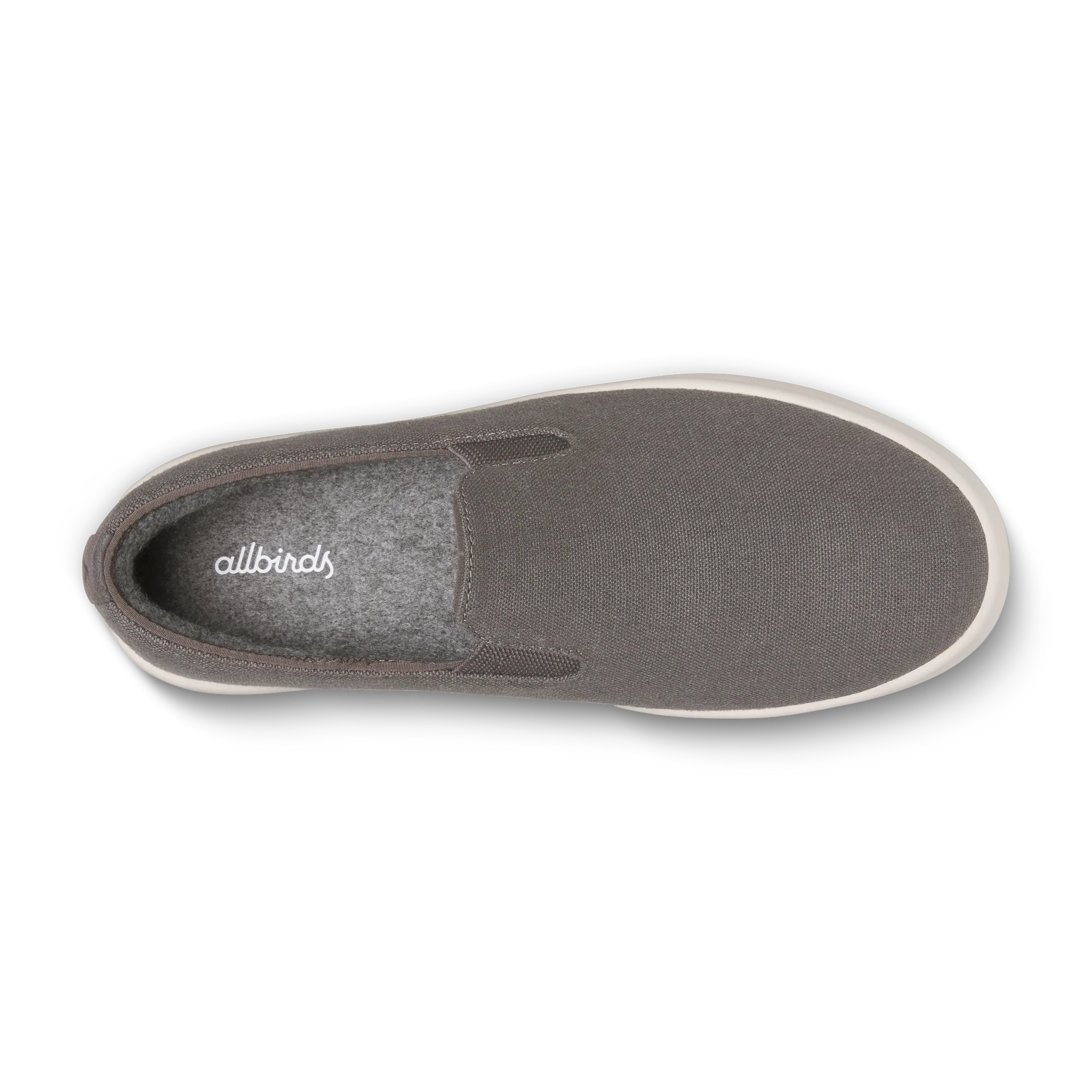 Grey fabric slip-on shoe with a white sole and a light grey fuzzy insole featuring the 'allbirds' logo.