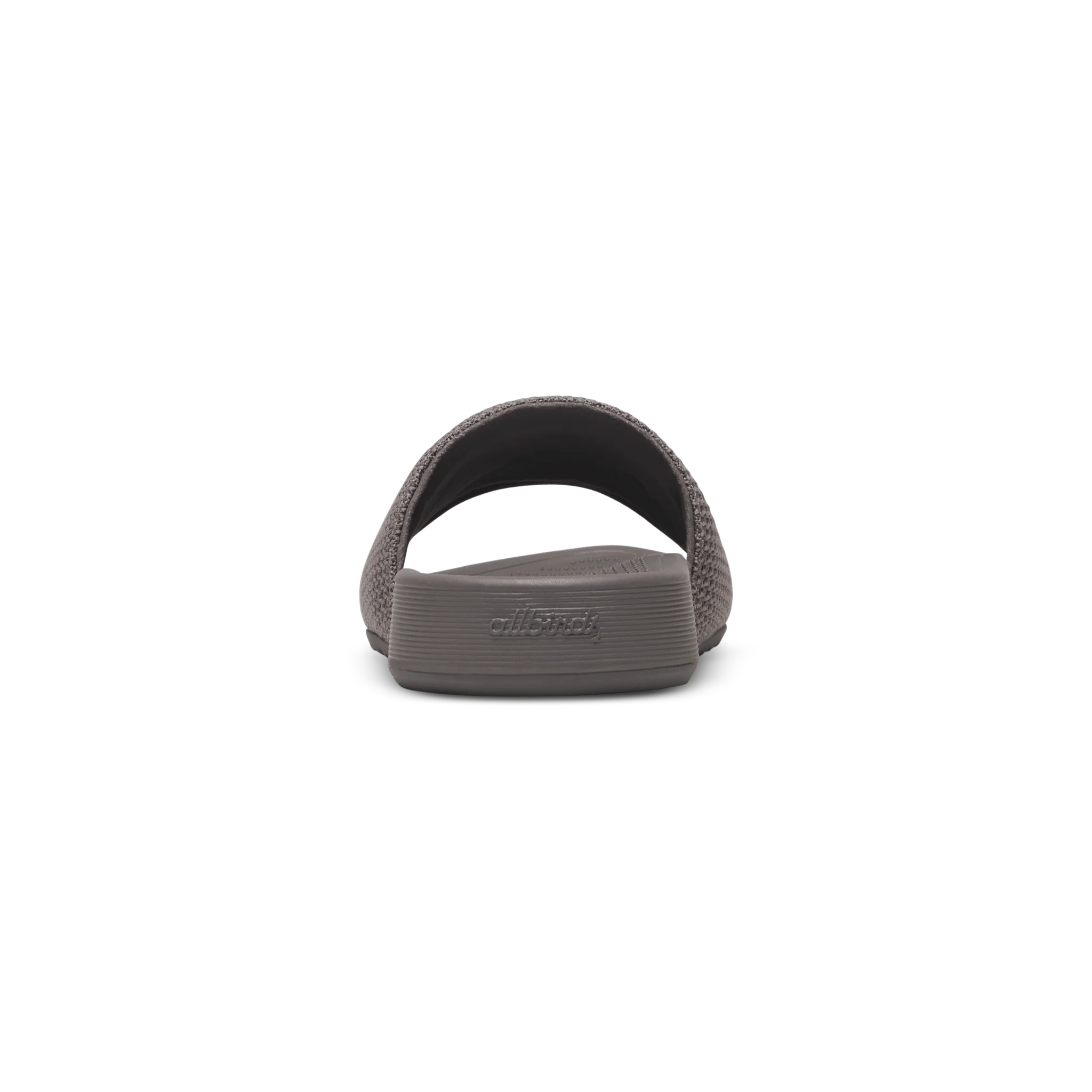 Grey slide sandal with a textured woven textile strap and a smooth sole with ridged sides. "allbirds" logo on footbed.