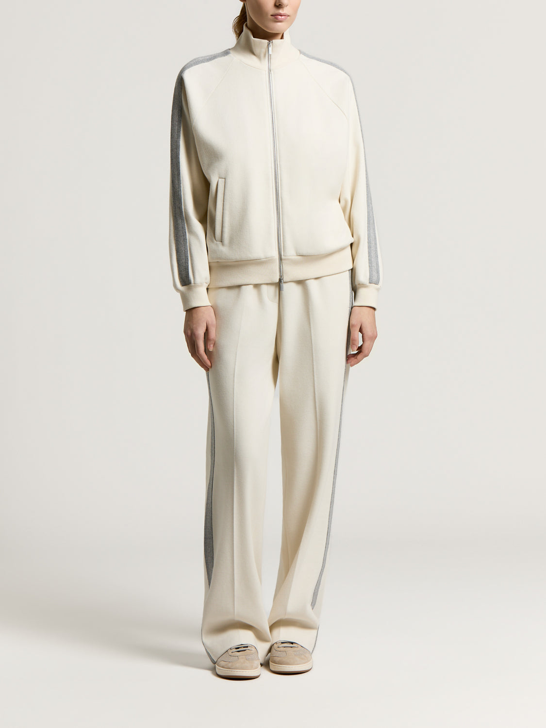 Star dust beige full-zip tracksuit. Sweatshirt with stand collar, ribbed trim, grey sleeve stripes. Wide-leg pants with grey