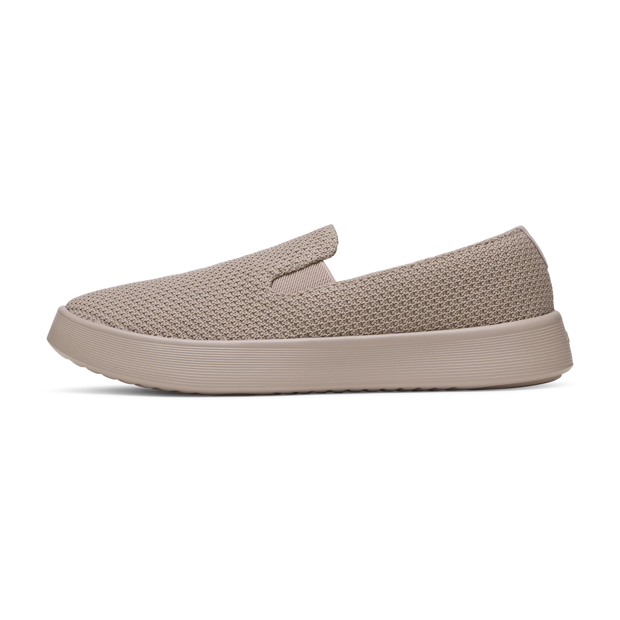 Brown knit slip-on shoe with a thick, ridged platform sole, viewed from the side.