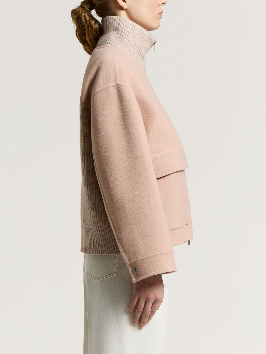 Mars Soil Beige short coat with a felted body and ribbed knit turtleneck. Features a silver-toned half-zip, wide sleeves, fla