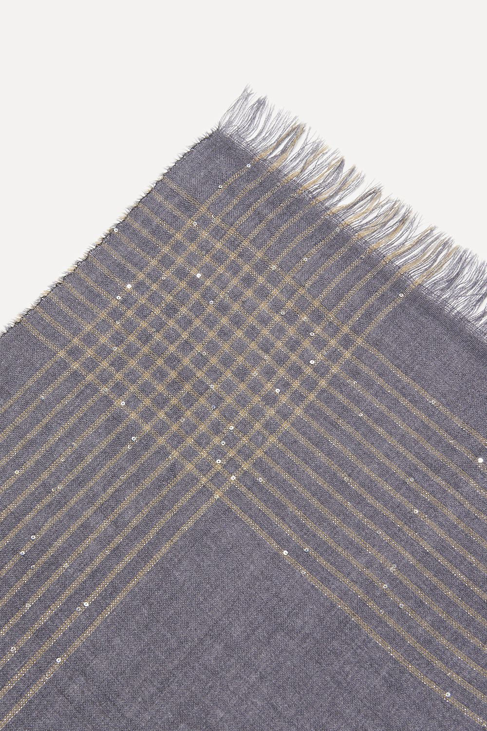 Eclipse gray scarf with a gold-toned plaid pattern, scattered silver-toned sequins, and fringed edges.