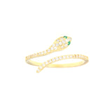 Gold-toned wrap-around snake ring. Its body is covered in clear stones, with two small green stones for eyes on the snake's h