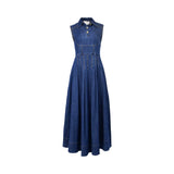 Front view of ANI Clothing sleeveless indigo denim maxi dress featuring gold buttons, a pointed collar, and a pleated A-line skirt.