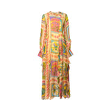 Front view of ANI CLOTHING long-sleeve maxi dress in yellow and pink floral patchwork print with ruffle trim.
