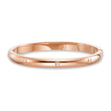 Rose-gold-toned stainless steel bangle with a smooth, polished finish, repeated Aigner 'A' logos, and a visible hinge clasp.