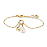 Gold-toned stainless steel chain bracelet with a gold-toned 'A' logo charm and an off-white baroque pearl charm.