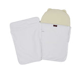 The Aigner Kids baby nest unzipped and open, showing the clean white interior lining and internal branding label.