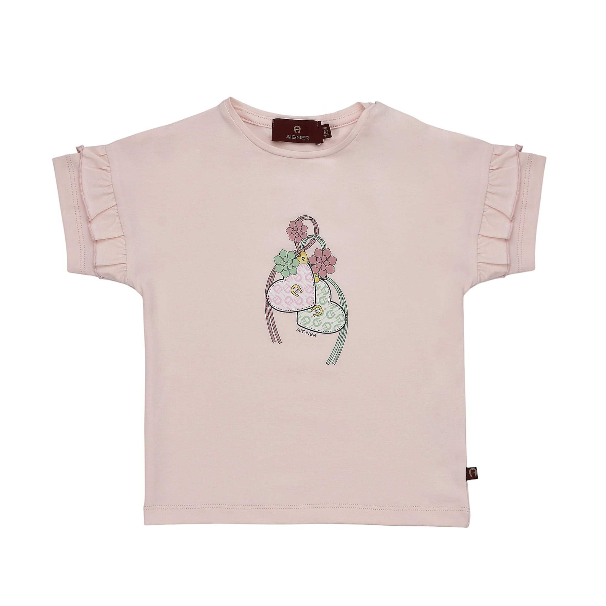 Pink Aigner Kids t-shirt with ruffled short sleeves and a central graphic print of three heart-shaped motifs and flowers.