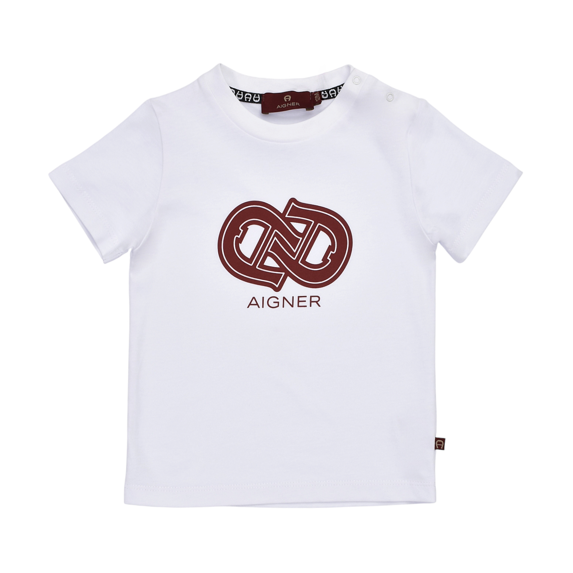 White baby boy T-shirt with short sleeves, round neck, shoulder snap buttons, and a large brown Aigner logo print on the fron